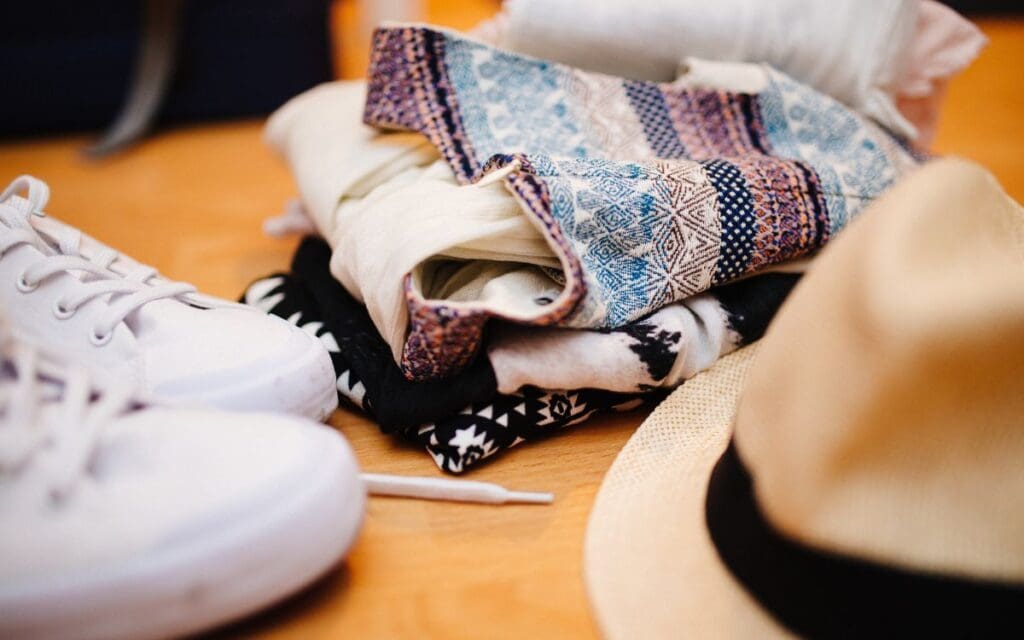 Top Packing Tips from Packing Experts in San Diego 5 packing experts in San Diego top packing tips packing experts san diego1 clothes and shoes ready to be packed