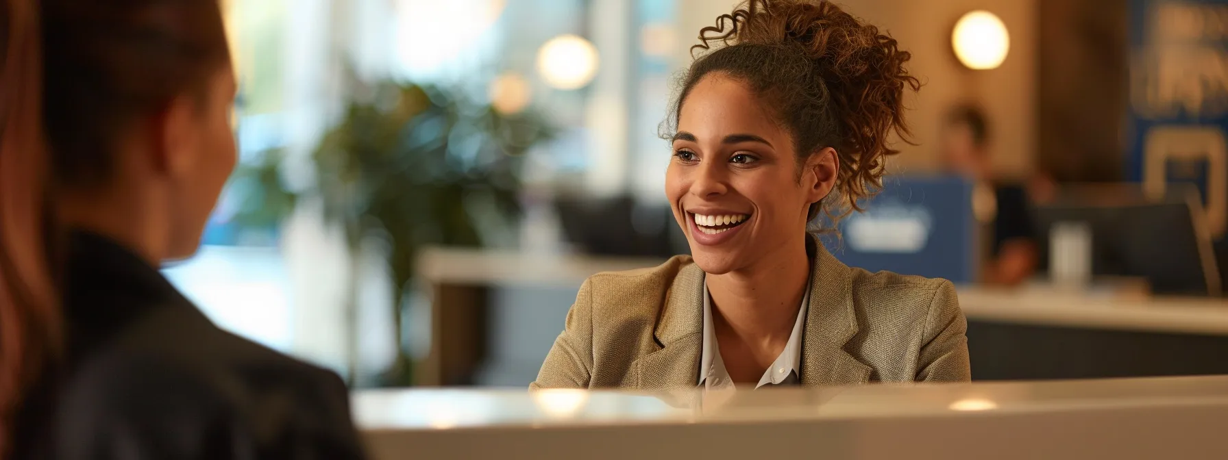 Choosing Your Affordable Moving Company in Oakland: A Guide 9 7ed90e57 1ad7 42cc 8a59 95917b84bc33 a friendly and efficient customer service representative assisting a client with a smile and helpful demeanor.