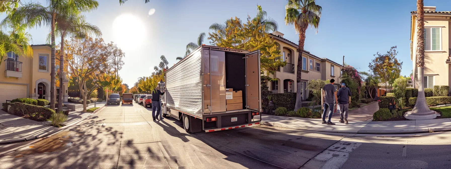 Maximizing Convenience With San Diego Local Moving Services 3 a8f51d57 bb9c 49fc ba4c c38fe97cde35 a team of experienced movers carefully loading shrink-wrapped furniture into a moving truck in a sunny san diego neighborhood.