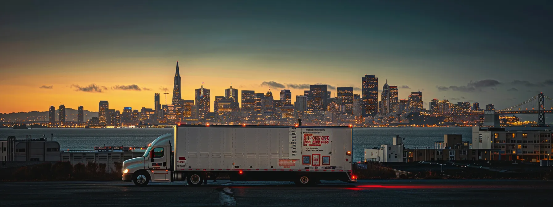 a professional moving truck parked in downtown san francisco with the city skyline in the background, displaying various licenses and certifications on its side. a professional moving truck parked in downtown san francisco with the city skyline in the background, displaying various licenses and certifications on its side.