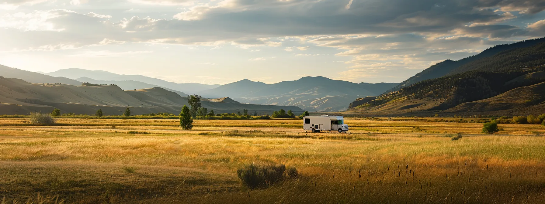 a neatly packed moving truck driving through a picturesque landscape, symbolizing the beginning of a stress-free cross country move. a neatly packed moving truck driving through a picturesque landscape, symbolizing the beginning of a stress-free cross country move.